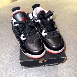 Brand new pair of toddler Jordan 4’s size 9